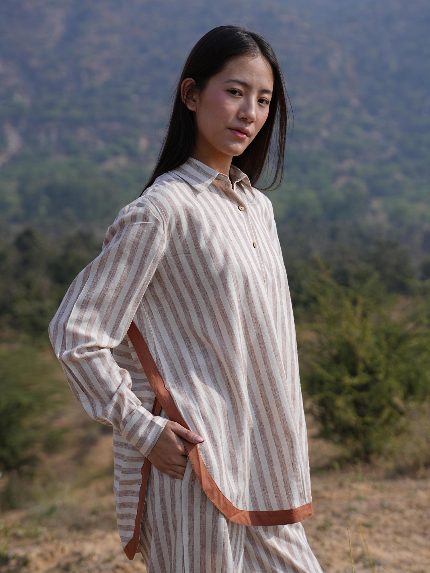 Full-length view of the striped cotton co-ord set, styled relaxed and anti-fit