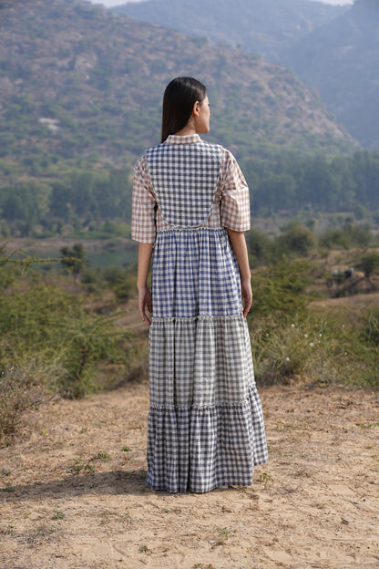 Detail of the clean French-seam finish on the checked cotton maxi dress
