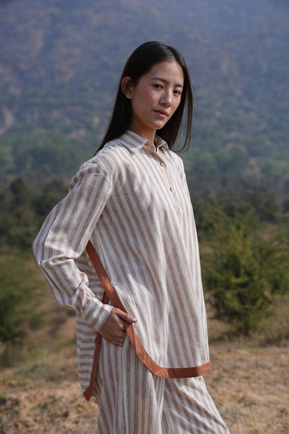Full-length view of the striped cotton co-ord set, styled relaxed and anti-fit