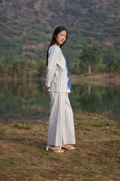 The long-sleeve tunic shown open over the matching striped trousers