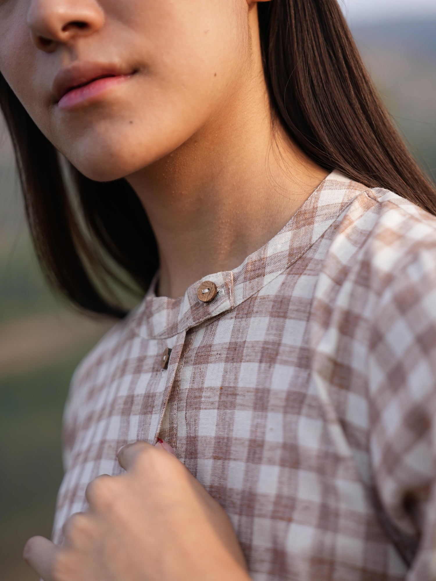 Model styling the checked cotton co-ord set for a warm summer day